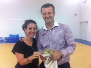 teacher and principal hold turtle