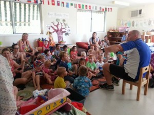 richard speaks to group of children